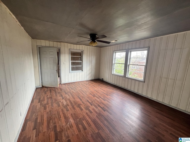 interior space featuring dark hardwood / wood-style floors and ceiling fan