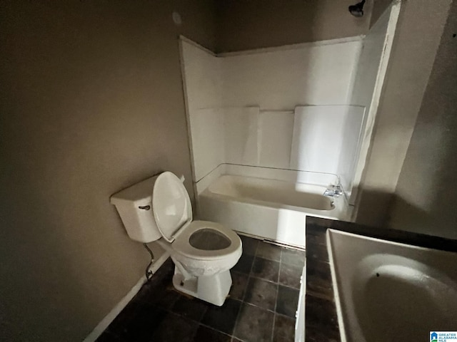 bathroom with bathtub / shower combination, tile patterned floors, and toilet