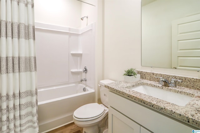 full bathroom with vanity, toilet, and shower / bath combo with shower curtain