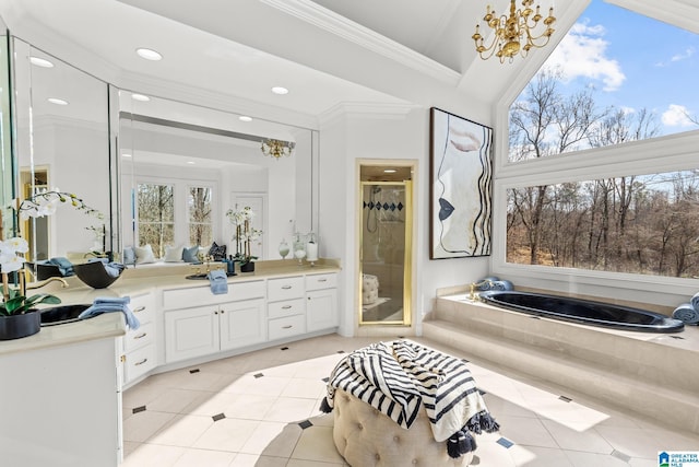 bathroom featuring tile patterned flooring, vanity, crown molding, and shower with separate bathtub