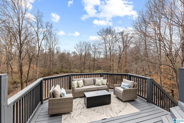 wooden deck with an outdoor hangout area