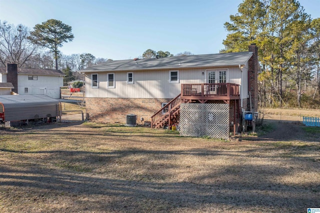 exterior space with central AC, a front yard, french doors, and a deck