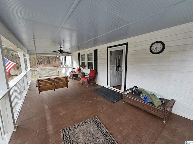 exterior space featuring ceiling fan and covered porch