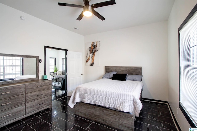 bedroom featuring ceiling fan