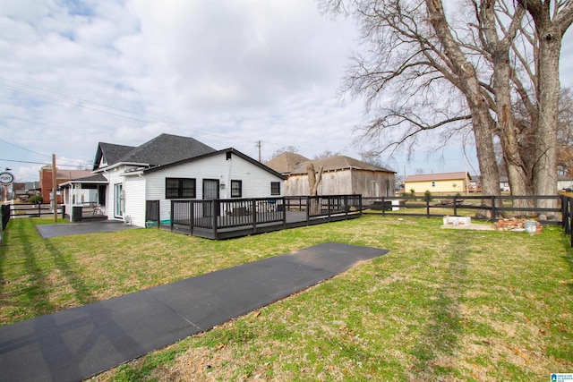 view of yard with a deck