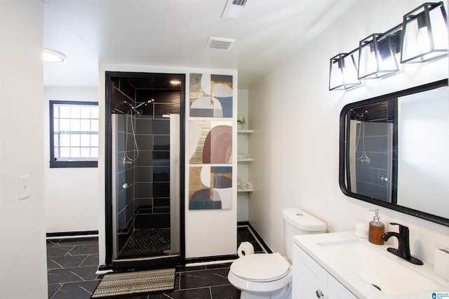 bathroom featuring walk in shower, tile patterned floors, vanity, and toilet