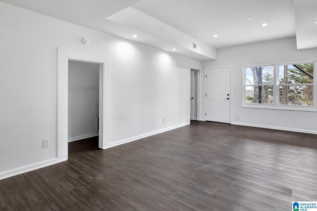 empty room featuring dark hardwood / wood-style floors