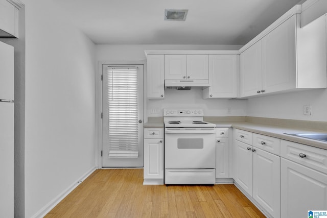 kitchen featuring white cabinetry, white appliances, sink, and light hardwood / wood-style floors