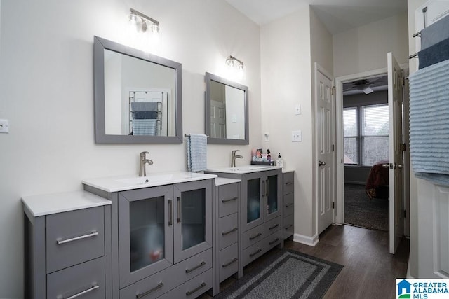 bathroom with vanity and hardwood / wood-style floors