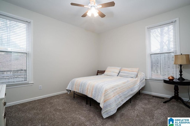 carpeted bedroom featuring ceiling fan