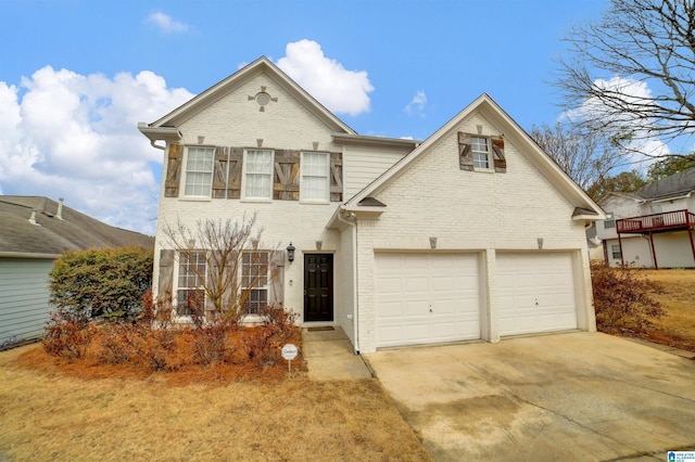 front of property with a garage