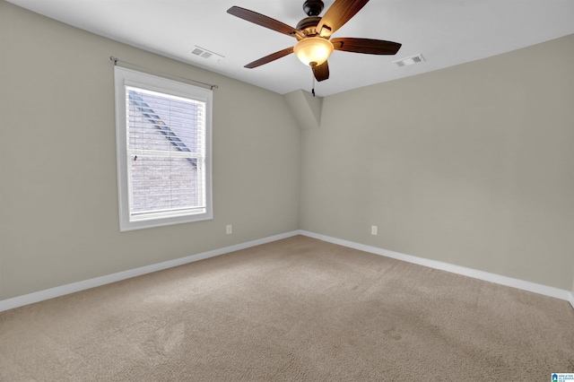 empty room featuring carpet and ceiling fan