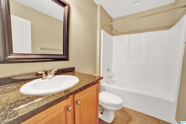 full bathroom with vanity, tile patterned flooring, shower / washtub combination, and toilet