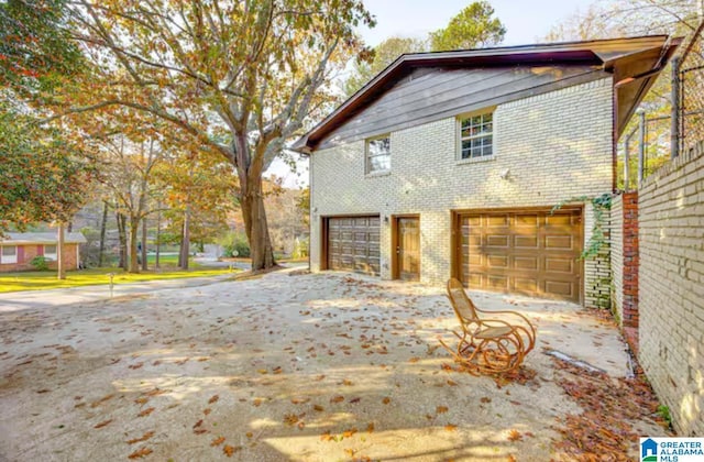 view of home's exterior with a garage