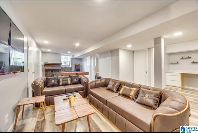 living room with light hardwood / wood-style flooring