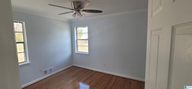 empty room with ceiling fan, ornamental molding, and hardwood / wood-style floors