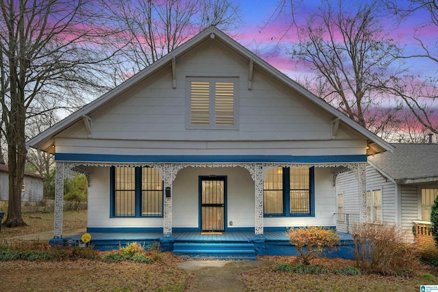 bungalow-style home with a porch