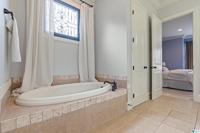 bathroom with tile patterned flooring, ornamental molding, and tiled bath