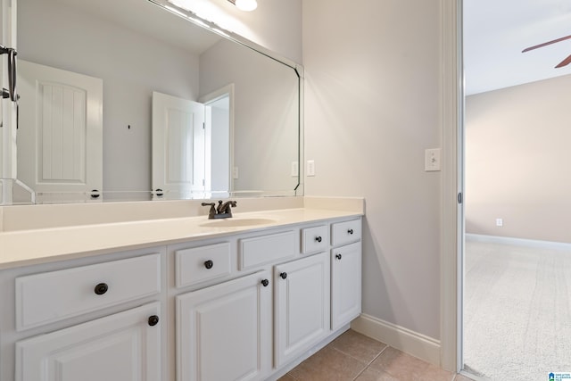 bathroom featuring vanity, tile patterned floors, and ceiling fan