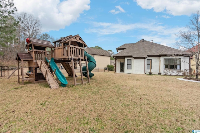 view of playground featuring a lawn