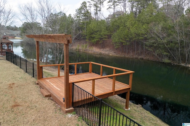 exterior space featuring a gazebo and a water view