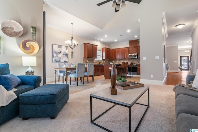 carpeted living room featuring ornamental molding and a wealth of natural light