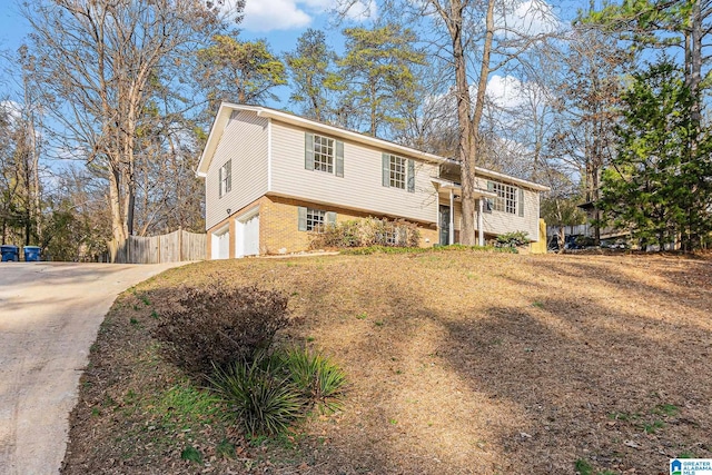 split foyer home featuring a garage