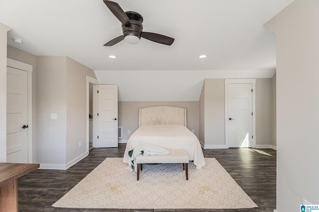 bedroom with dark wood-style floors, recessed lighting, and baseboards