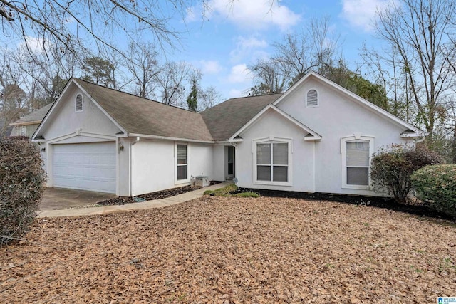 ranch-style home featuring a garage