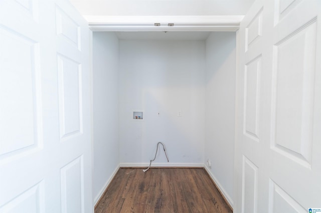 clothes washing area featuring dark hardwood / wood-style flooring and hookup for a washing machine