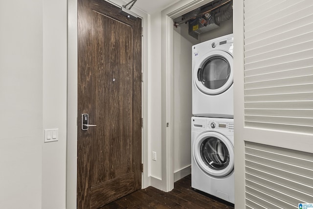1150 8th St Unit 503, Tuscaloosa, AL 35401 - washroom featuring stacked washer / drying machine and dark hardwood / wood-style flooring