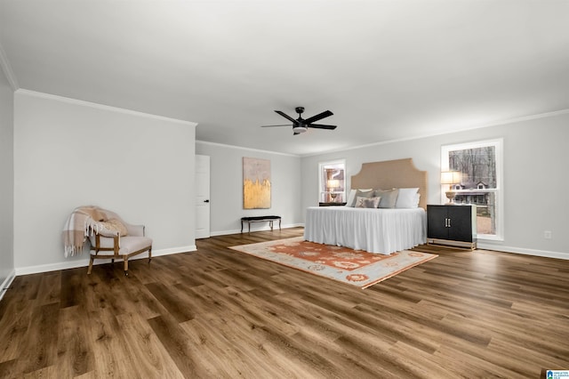 unfurnished bedroom with crown molding, hardwood / wood-style flooring, and ceiling fan