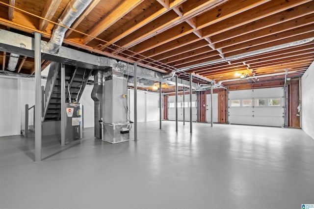 basement with heating unit and water heater