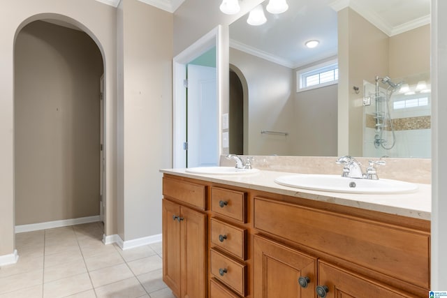 bathroom with ornamental molding, tile patterned flooring, vanity, and a shower