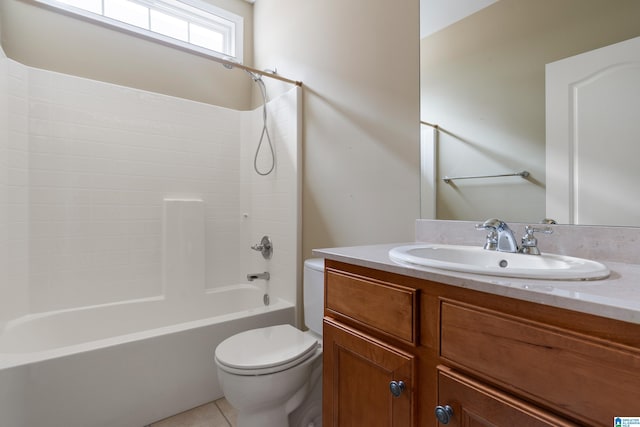 full bathroom featuring vanity, tile patterned floors, washtub / shower combination, and toilet