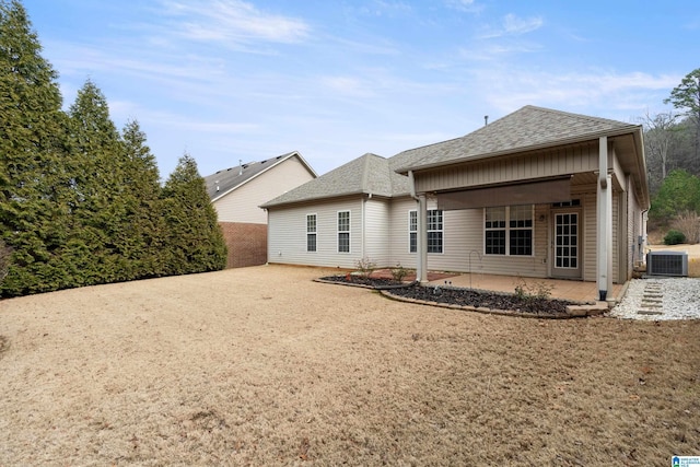 back of house with central AC and a patio