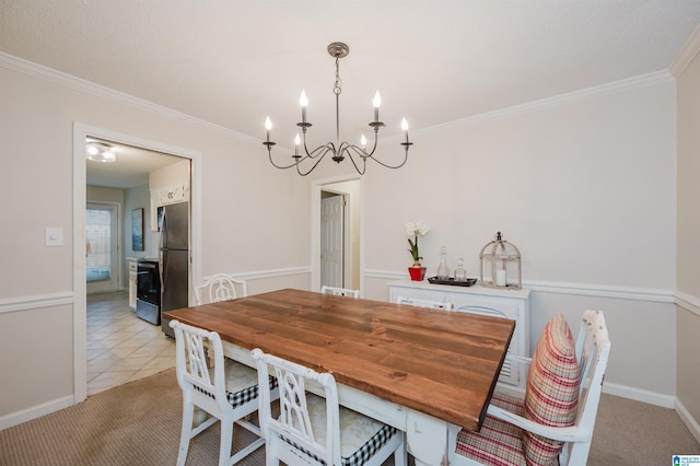 carpeted dining area with crown molding and a notable chandelier