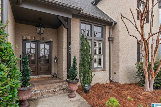 doorway to property featuring french doors