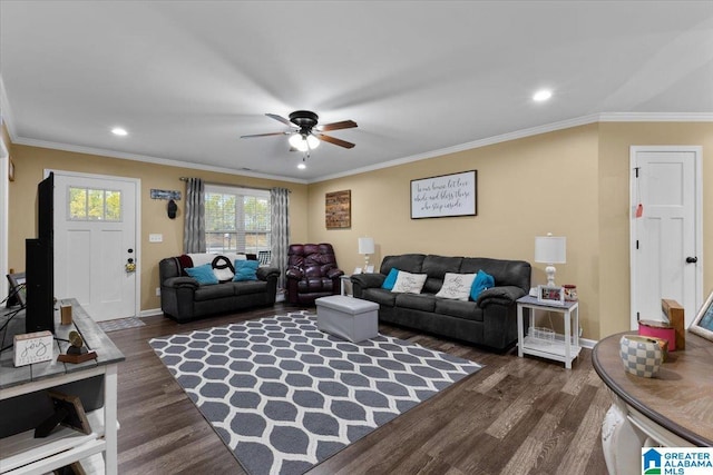 living room with crown molding, ceiling fan, and dark hardwood / wood-style flooring