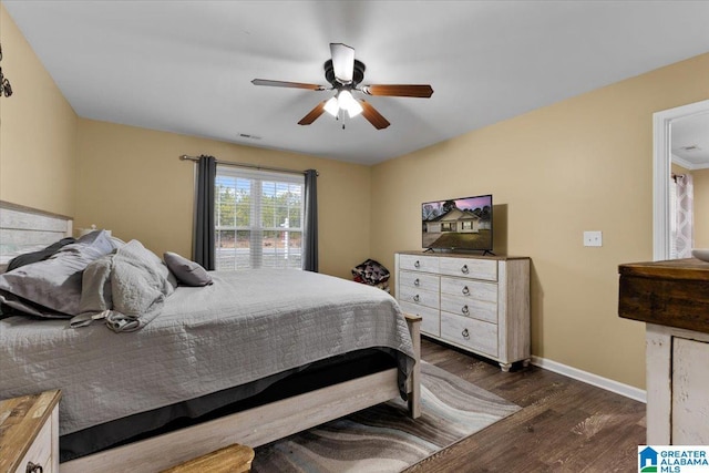 bedroom featuring dark wood-type flooring and ceiling fan