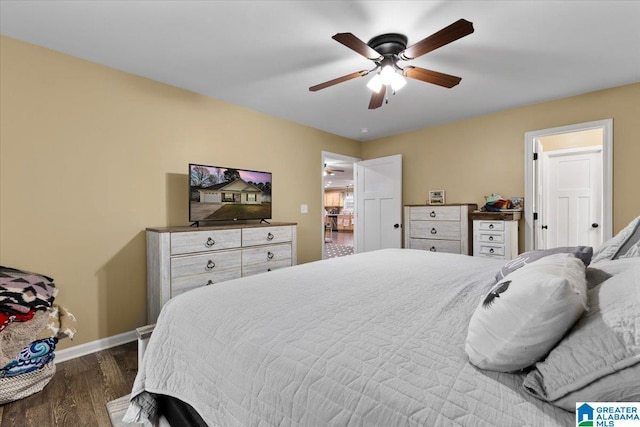 bedroom featuring dark hardwood / wood-style floors and ceiling fan