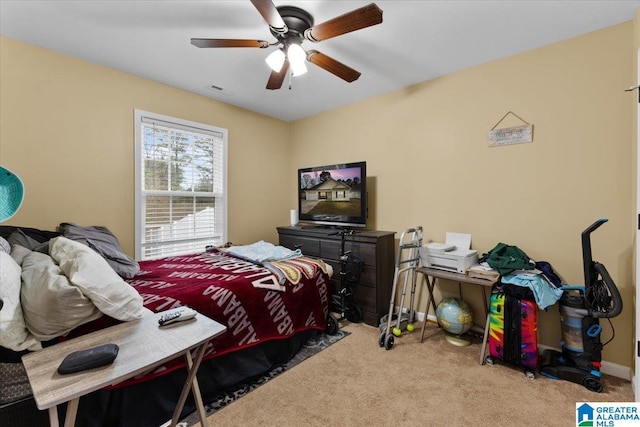 carpeted bedroom featuring ceiling fan