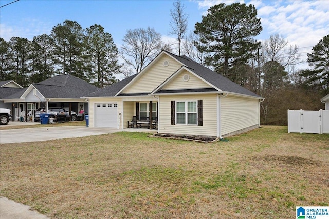 view of front of house with a garage, a porch, and a front yard