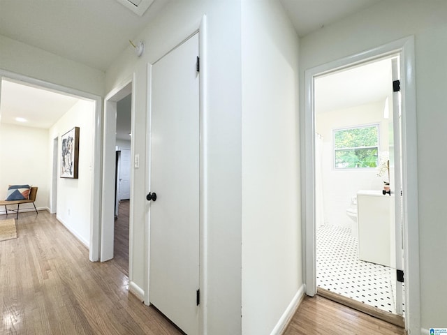 hall featuring light wood-type flooring