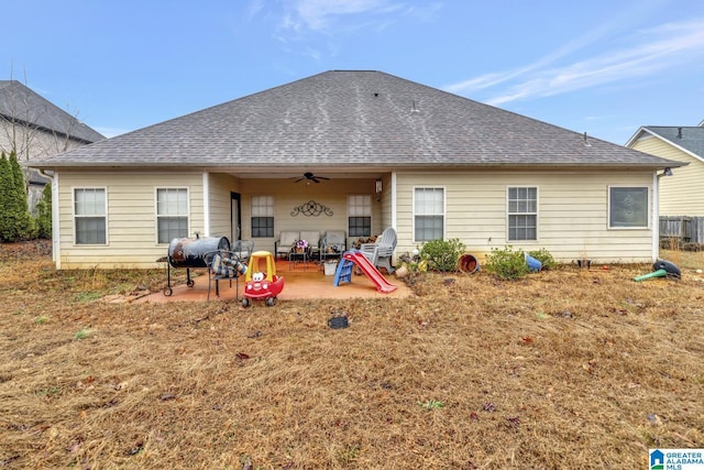 rear view of house featuring a patio area and ceiling fan