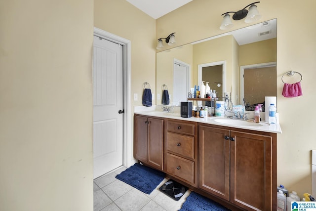 bathroom featuring vanity and tile patterned flooring