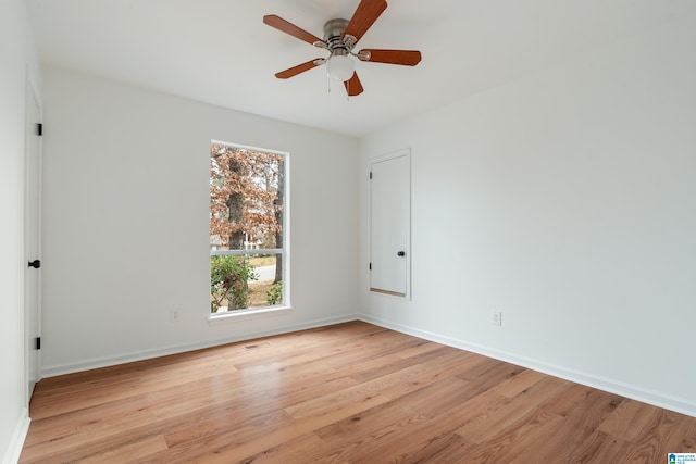 unfurnished room featuring ceiling fan and light hardwood / wood-style flooring