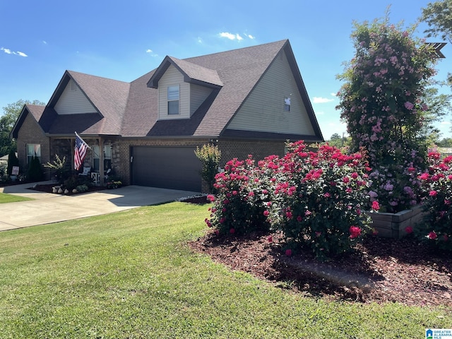 view of front facade featuring a garage and a front lawn