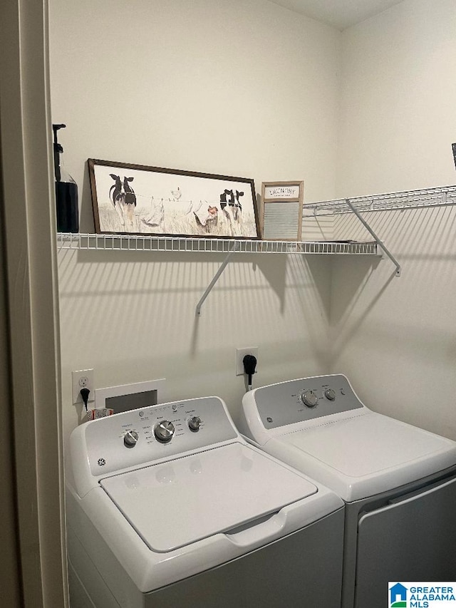 laundry area with washer and dryer