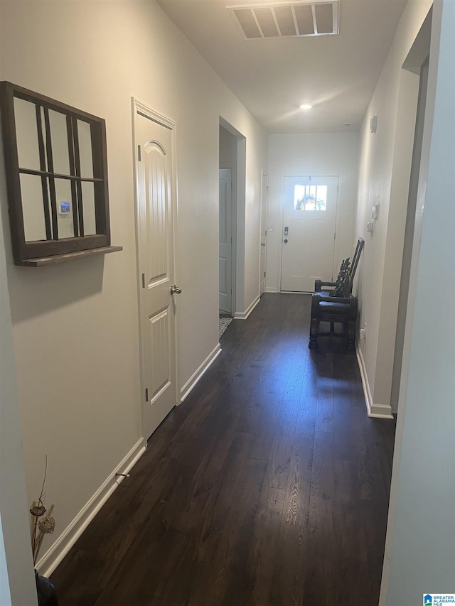 hall featuring dark hardwood / wood-style floors